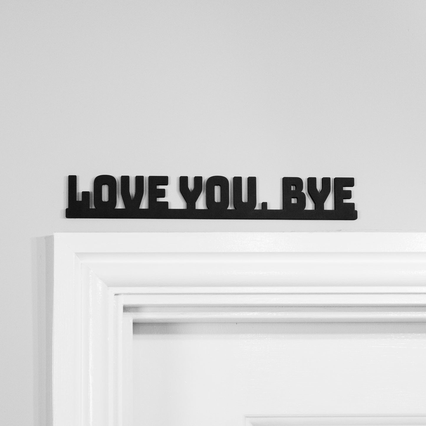 love you bye sign on the door front the front