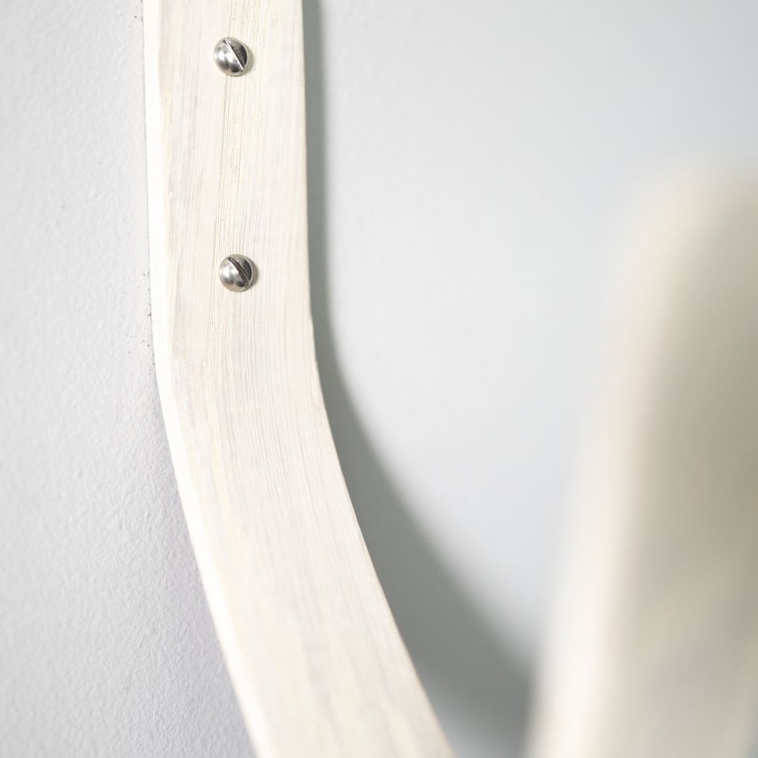 Surfboard securely mounted on wall using premium wooden wall mount