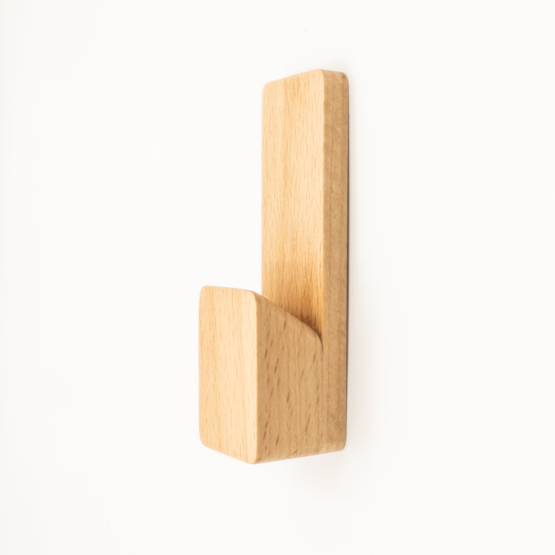 Durable beech hardwood wall hook supporting heavy items up to 5 kg