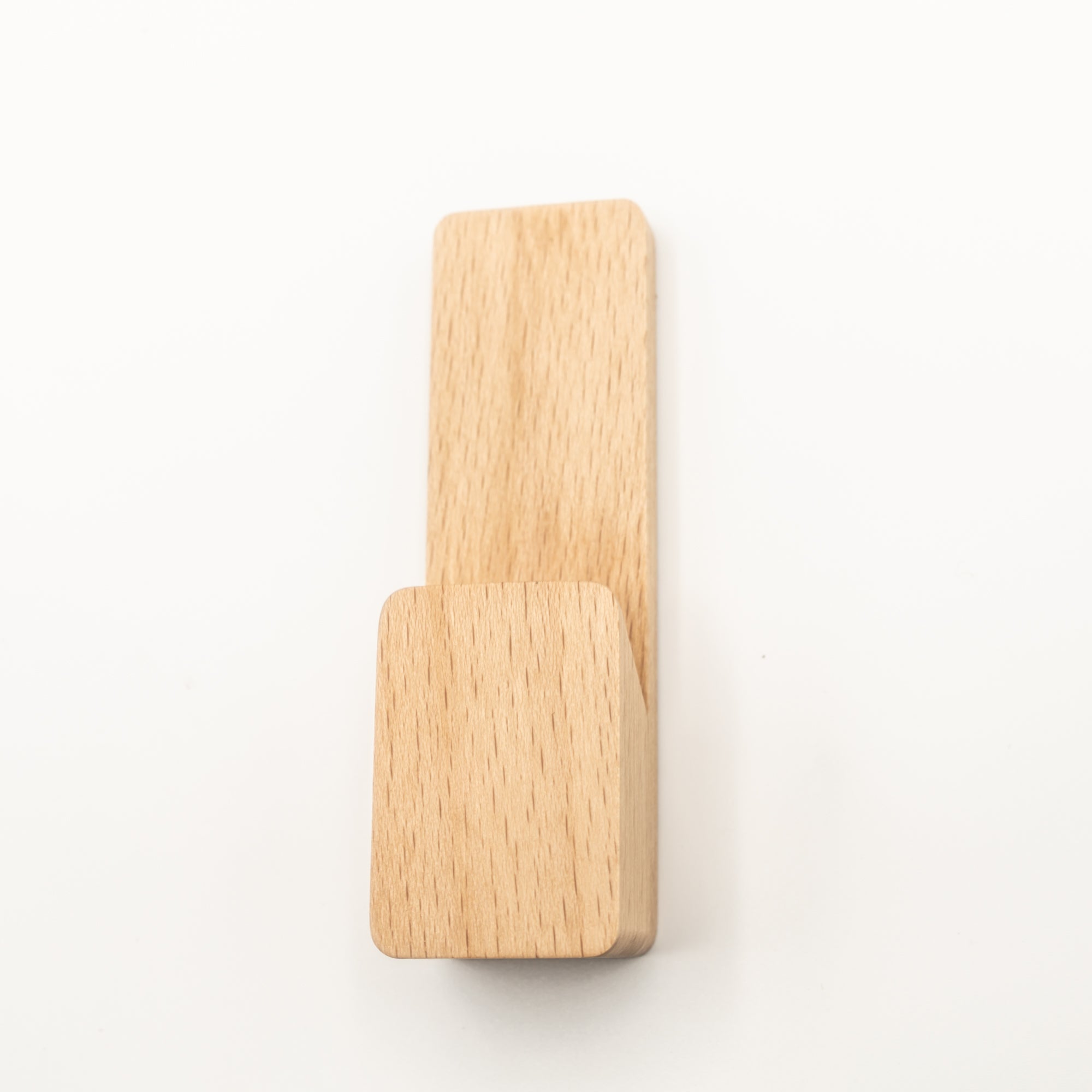 Natural beech hook adding warm minimalist style to any room