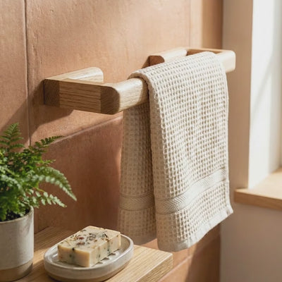 towel rail on restroom wall